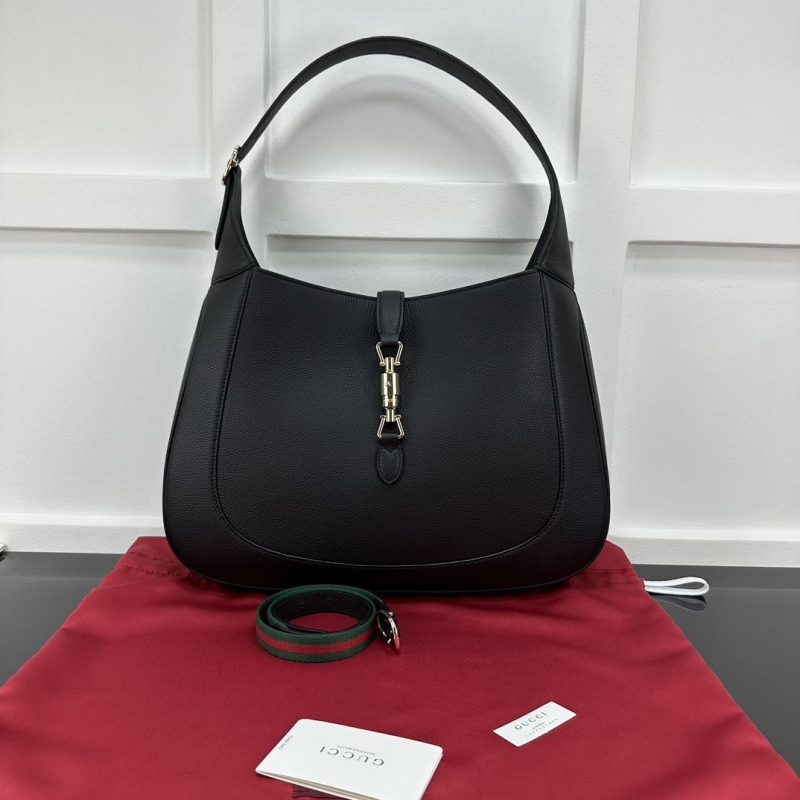 G*u*i top handle bags
